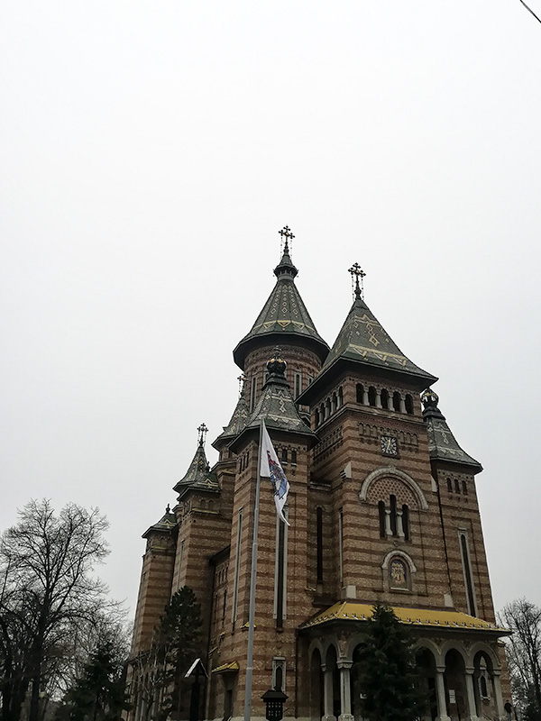 A orthodox church in the center of the picture